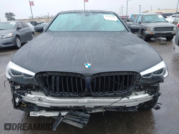 2019 BMW 5 Series 530e iPerformance with VIN WBAJA9C53KB399794, listed as a IAAI auction lot 41561874 with Not Provided miles. Bid and sale history available at carsss.com. Image 12.