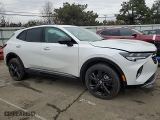 2023 Buick Envision Essence with VIN LRBFZPR42PD228047, listed as a Copart auction lot 44230655 with 11,400 mi miles and Salvage Title. Bid and sale history available at carsss.com. Image 4.