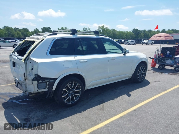 2016 Volvo XC90 T6 Momentum with VIN YV4A22PK8G1034321, listed as a IAAI auction lot 42424745 with 141,771 mi miles and . Bid and sale history available at DreamBid. Image 4.