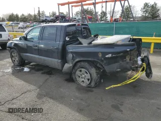 2006 Dodge Dakota SLT z VIN 1D7HW48N66S716560, wystawiony jako Copart lot #49677695 z przebiegiem 163 717 mil mil oraz Szkoda całkowita • Salvage title. Historia ofert i sprzedaży dostępna na DreamBid. Obrazek 2.
