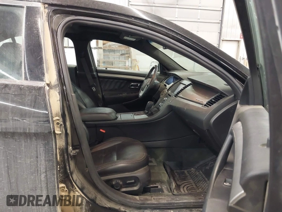 2014 Ford Taurus SEL with VIN 1FAHP2E87EG117653, listed as a IAAI auction lot 41589415 with 125,040 mi miles. Bid and sale history available at carsss.com. Image 5.