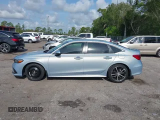 2023 Honda Civic Touring with VIN 2HGFE1F91PH305053, listed as a IAAI auction lot 42378311 with 41,576 mi miles and . Bid and sale history available at DreamBid. Image 15.