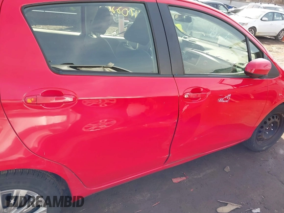 2013 Toyota Yaris L with VIN JTDKTUD35DD560686, listed as a IAAI auction lot 41702208 with 142,174 mi miles. Bid and sale history available at carsss.com. Image 14.