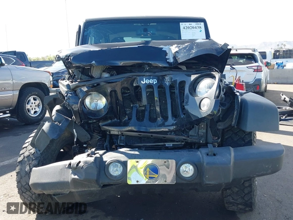 2014 Jeep Wrangler Sport with VIN 1C4AJWAG7EL100344, listed as a IAAI auction lot 42020438 with 87,279 mi miles and . Bid and sale history available at carsss.com. Image 12.