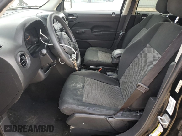 2014 Jeep Patriot Sport z VIN 1C4NJPBA6ED574930, wystawiony jako Copart lot #55684595 z przebiegiem 101 772 mil mil oraz Szkoda całkowita • Salvage title. Historia ofert i sprzedaży dostępna na DreamBid. Obrazek 7.