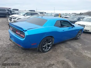 2015 Dodge Challenger R/T with VIN 2C3CDZAT6FH878216, listed as a IAAI auction lot 41304913 with 104,176 mi miles. Bid and sale history available at carsss.com. Image 4.