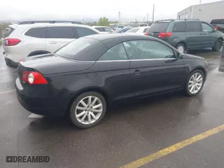 2010 Volkswagen Eos Komfort with VIN WVWBA7AH2AV020306, listed as a IAAI auction lot 42066892 with 180,841 mi miles. Bid and sale history available at carsss.com. Image 4.