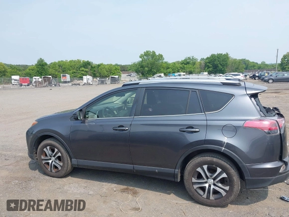 2017 Toyota RAV4 LE with VIN JTMBFREV6HD205665, listed as a IAAI auction lot 42436639 with 217,744 mi miles and . Bid and sale history available at DreamBid. Image 14.
