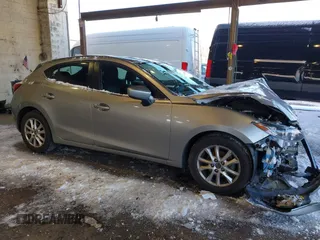 2015 Mazda Mazda3 i Touring with VIN 3MZBM1L71FM188994, listed as a IAAI auction lot 41367866 with 114,985 mi miles. Bid and sale history available at carsss.com. Image 1.