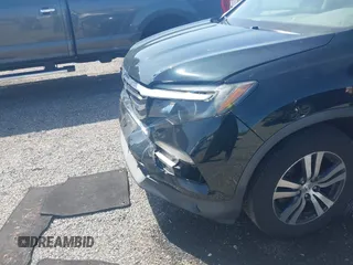 2017 Honda Pilot EX-L z VIN 5FNYF6H51HB091555, wystawiony jako IAAI lot #42141088 z przebiegiem 127 327 mil mil oraz . Historia ofert i sprzedaży dostępna na DreamBid. Obrazek 6.