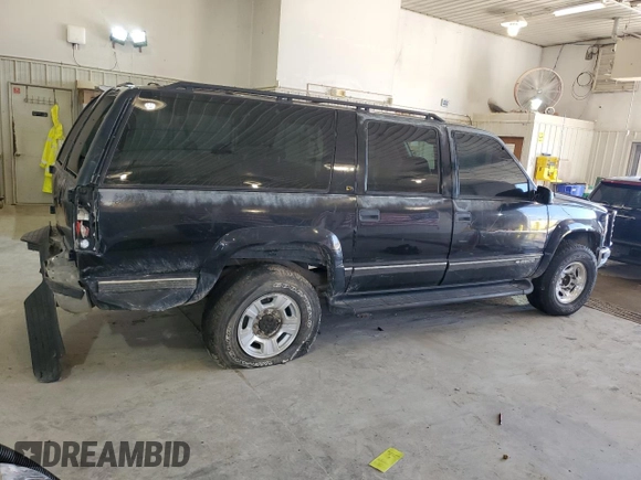 1999 Chevrolet Suburban with VIN 1GNGK26J6XJ444189, listed as a Copart auction lot 68249474 with 216,412 mi miles and Salvage Title. Bid and sale history available at carsss.com. Image 3.