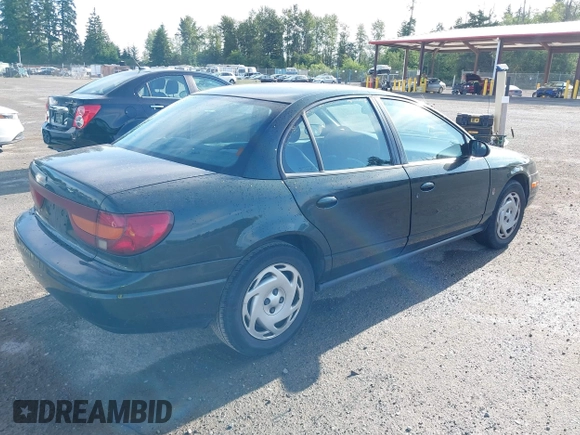 2000 Saturn SL z VIN 1G8ZK5271YZ165467, wystawiony jako IAAI lot #42367156 z przebiegiem 185 962 mil mil oraz . Historia ofert i sprzedaży dostępna na DreamBid. Obrazek 4.