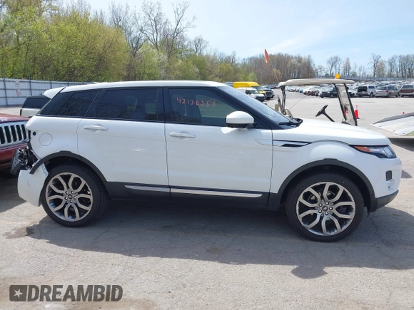 2015 Land Rover Range Rover Evoque Prestige with VIN SALVV2BG4FH076675, listed as a IAAI auction lot 42138353 with 99,751 mi miles and . Bid and sale history available at DreamBid. Image 13.