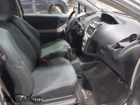 2008 Toyota Yaris with VIN JTDJT923085171725, listed as a IAAI auction lot 42090252 with 242,092 mi miles. Bid and sale history available at carsss.com. Image 5.