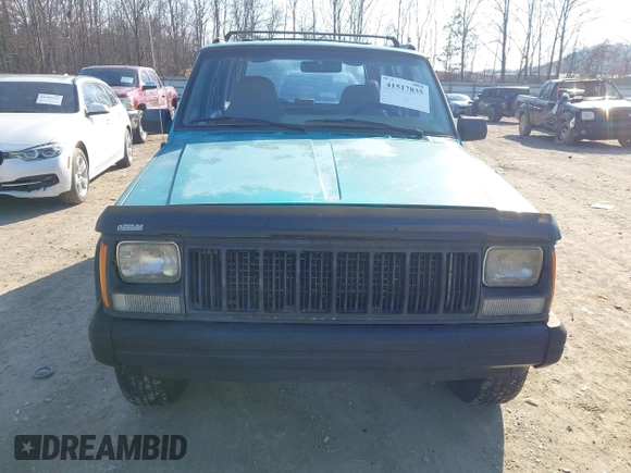 1996 Jeep Cherokee Sport z VIN 1J4FJ68S2TL103997, wystawiony jako IAAI lot #41517835 z przebiegiem 175 560 mil mil oraz . Historia ofert i sprzedaży dostępna na DreamBid. Obrazek 6.
