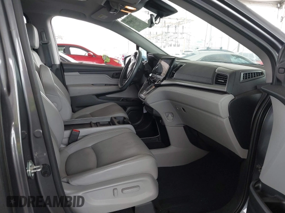 2019 Honda Odyssey Touring z VIN 5FNRL6H88KB037149, wystawiony jako IAAI lot #42356871 z przebiegiem 64 549 mil mil oraz . Historia ofert i sprzedaży dostępna na DreamBid. Obrazek 5.
