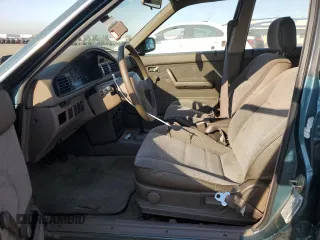 1992 Mazda 626 z VIN 1YVGD22B5N5212605, wystawiony jako Copart lot #74945704 z przebiegiem 99 659 mil mil oraz Tytuł czysty. Historia ofert i sprzedaży dostępna na DreamBid. Obrazek 7.