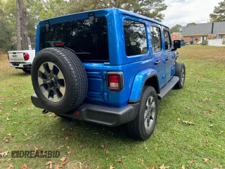 2022 Jeep Wrangler Unlimited Sahara Altitude with VIN 1C4HJXEG6NW248854, listed as a Copart auction lot 80591644 with 33,569 mi miles and Clean title. Bid and sale history available at DreamBid. Image 4.