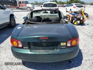 1999 Mazda MX-5 Miata with VIN JM1NB3530X0118452, listed as a Copart auction lot 53337575 with 150,574 mi miles and Clean title. Bid and sale history available at DreamBid. Image 6.