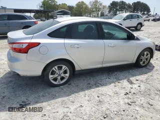 2013 Ford Focus SE z VIN 1FADP3F2XDL258267, wystawiony jako Copart lot #51500095 z przebiegiem 144 370 mil mil oraz Tytuł czysty. Historia ofert i sprzedaży dostępna na DreamBid. Obrazek 3.