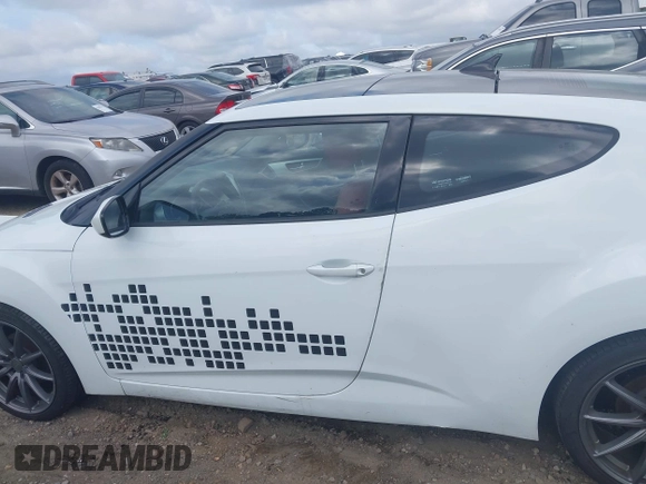 2013 Hyundai Veloster w/Gray Int z VIN KMHTC6AD3DU131703, wystawiony jako IAAI lot #42468831 z przebiegiem 188 513 mil mil oraz . Historia ofert i sprzedaży dostępna na DreamBid. Obrazek 15.