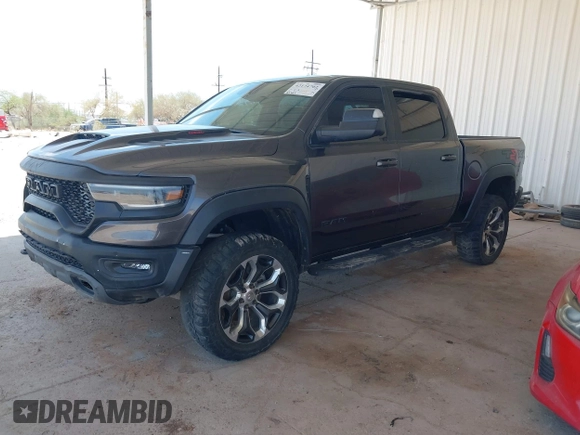 2022 Ram 1500 TRX with VIN 1C6SRFU97NN353587, listed as a IAAI auction lot 42174702 with 35,305 mi miles and . Bid and sale history available at DreamBid. Image 2.