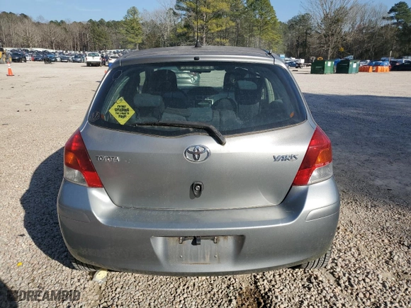 2009 Toyota Yaris with VIN JTDKT903X95240915, listed as a Copart auction lot 49143135 with 188,817 mi miles and Clean Title. Bid and sale history available at carsss.com. Image 6.