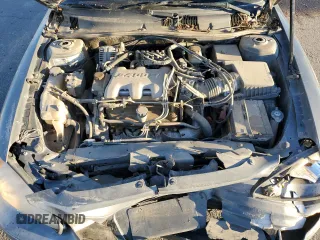 2005 Pontiac Grand Am SE with VIN 1G2NE52E25M135756, listed as a Copart auction lot 79969414 with 128,576 mi miles and Salvage Title. Bid and sale history available at carsss.com. Image 13.
