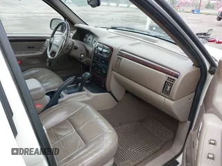 2001 Jeep Grand Cherokee Limited with VIN 1J4GW58N01C587109, listed as a IAAI auction lot 41929445 with 247,066 mi miles. Bid and sale history available at carsss.com. Image 5.