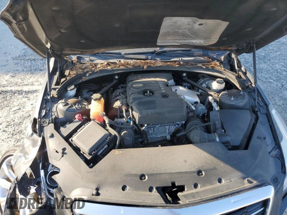 2015 Cadillac ATS Standard AWD z VIN 1G6AG1RX6F0123027, wystawiony jako Copart lot #75849154 z przebiegiem 40 857 mil mil oraz Szkoda całkowita • Salvage title. Historia ofert i sprzedaży dostępna na DreamBid. Obrazek 12.
