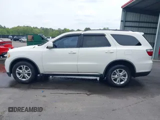 2012 Dodge Durango Crew with VIN 1C4RDHDG9CC152766, listed as a IAAI auction lot 42038931 with 288,545 mi miles and . Bid and sale history available at DreamBid. Image 14.
