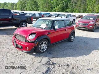 2012 MINI Hardtop with VIN WMWSU3C59CT260497, listed as a IAAI auction lot 42083090 with 123,498 mi miles and . Bid and sale history available at DreamBid. Image 2.