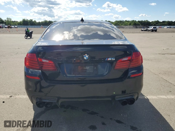 2014 BMW M5 z VIN WBSFV9C53ED594132, wystawiony jako Copart lot #67114384 z przebiegiem 89 020 mil mil oraz Szkoda całkowita • Salvage title. Historia ofert i sprzedaży dostępna na DreamBid. Obrazek 6.