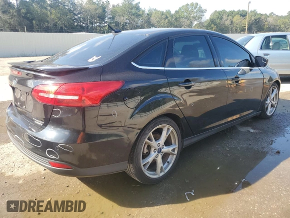2015 Ford Focus Titanium with VIN 1FADP3J29FL311471, listed as a Copart auction lot 87805235 with 195,026 mi miles and Salvage Title. Bid and sale history available at carsss.com. Image 3.