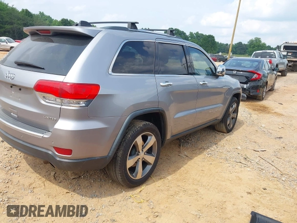2014 Jeep Grand Cherokee Limited with VIN 1C4RJFBG9EC210507, listed as a IAAI auction lot 42428788 with 141,147 mi miles and . Bid and sale history available at DreamBid. Image 4.
