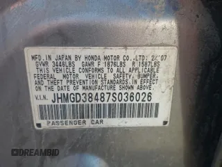 2007 Honda Fit with VIN JHMGD38487S036026, listed as a Copart auction lot 67660424 with 196,121 mi miles and Salvage Title. Bid and sale history available at carsss.com. Image 12.