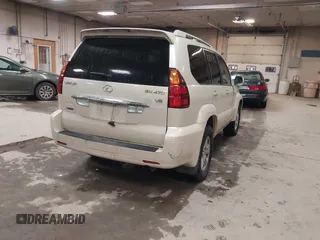 2003 Lexus GX 470 z VIN JTJBT20X930010939, wystawiony jako IAAI lot #42343382 z przebiegiem 294 100 mil mil oraz . Historia ofert i sprzedaży dostępna na DreamBid. Obrazek 4.
