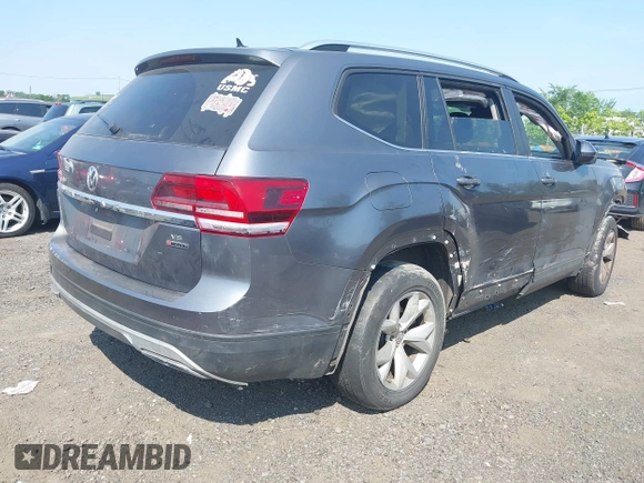 2018 Volkswagen Atlas SE with VIN 1V2KR2CA3JC504717, listed as a IAAI auction lot 42414174 with 105,909 mi miles and . Bid and sale history available at DreamBid. Image 4.