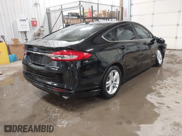 2018 Ford Fusion SE z VIN 3FA6P0LU3JR203864, wystawiony jako IAAI lot #41476335 z przebiegiem 49 246 mil mil oraz . Historia ofert i sprzedaży dostępna na DreamBid. Obrazek 4.