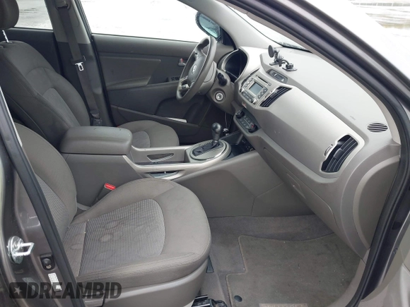 2015 Kia Sportage LX with VIN KNDPB3AC1F7784479, listed as a IAAI auction lot 42124599 with 137,190 mi miles and . Bid and sale history available at carsss.com. Image 5.