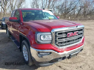 2019 GMC Sierra 1500 SLE z VIN 2GTV2MEC1K1212973, wystawiony jako IAAI lot #41856568 z przebiegiem 32 852 mil mil oraz . Historia ofert i sprzedaży dostępna na DreamBid. Obrazek 1.