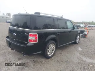 2014 Ford Flex SEL z VIN 2FMHK6C89EBD00168, wystawiony jako IAAI lot #42289106 z przebiegiem 158 598 mil mil oraz . Historia ofert i sprzedaży dostępna na DreamBid. Obrazek 4.