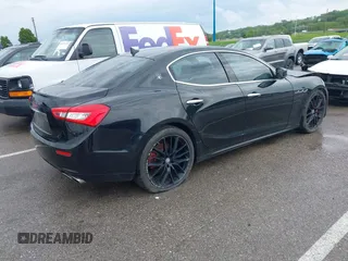 2014 Maserati Ghibli z VIN ZAM57XSA7E1091443, wystawiony jako IAAI lot #42163436 z przebiegiem 76 762 mil mil oraz . Historia ofert i sprzedaży dostępna na DreamBid. Obrazek 4.