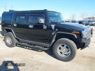 2005 Hummer H2 SUV with VIN 5GRGN23U65H122363, listed as a IAAI auction lot 41788338 with 121,099 mi miles. Bid and sale history available at carsss.com. Image 1.