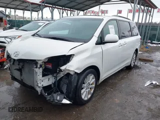 2015 Toyota Sienna Ltd with VIN 5TDDK3DC9FS115784, listed as a IAAI auction lot 41355934 with 125,675 mi miles. Bid and sale history available at carsss.com. Image 2.