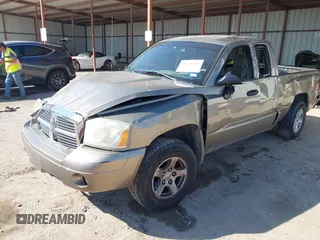 2006 Dodge Dakota SLT with VIN 1D7HE42K16S666071, listed as a IAAI auction lot 41676231 with 129,977 mi miles and . Bid and sale history available at carsss.com. Image 17.