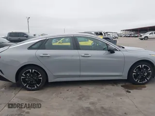 2024 Kia K5 GT-Line z VIN 5XXG64J29RG237148, wystawiony jako IAAI lot #41396574 z przebiegiem 22 926 mil mil oraz . Historia ofert i sprzedaży dostępna na DreamBid. Obrazek 14.