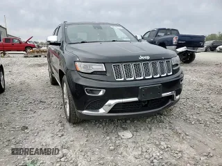 2014 Jeep Grand Cherokee Summit with VIN 1C4RJFJG1EC323658, listed as a Copart auction lot 50740115 with 253,656 mi miles and Salvage title. Bid and sale history available at DreamBid. Image 12.