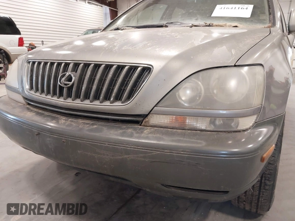 2000 Lexus RX 300 z VIN JT6HF10U6Y0129714, wystawiony jako IAAI lot #41641164 z przebiegiem 174 537 mil mil oraz . Historia ofert i sprzedaży dostępna na DreamBid. Obrazek 6.