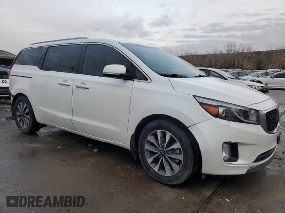 2015 Kia Sedona SX with VIN KNDMC5C19F6032915, listed as a Copart auction lot 82626784 with 135,594 mi miles and Salvage Title. Bid and sale history available at carsss.com. Image 4.